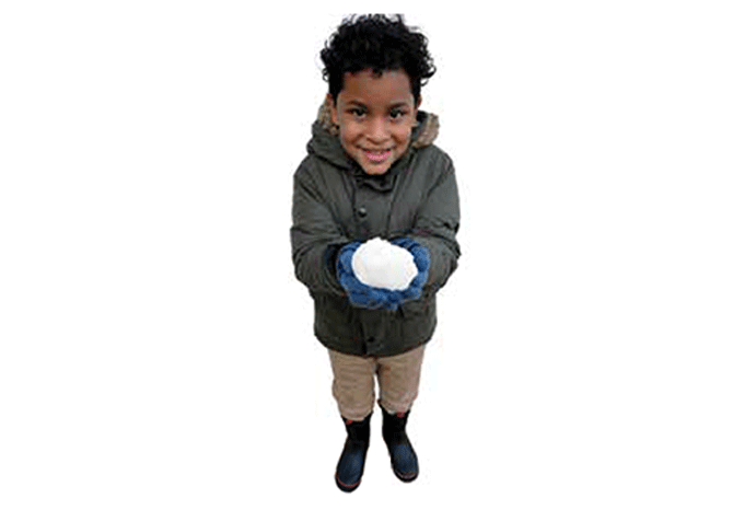 Boy holding a snowball